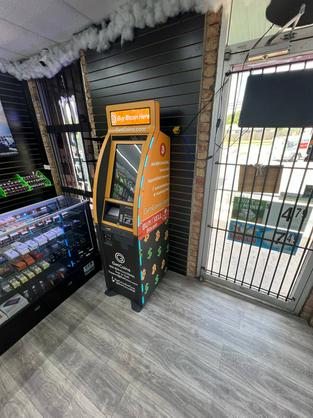 GetCoins - Bitcoin ATM - inside of Zebra Smoke Shop